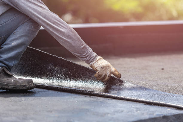 Professional Exterior Waterproofing technician working in Dansville, NY